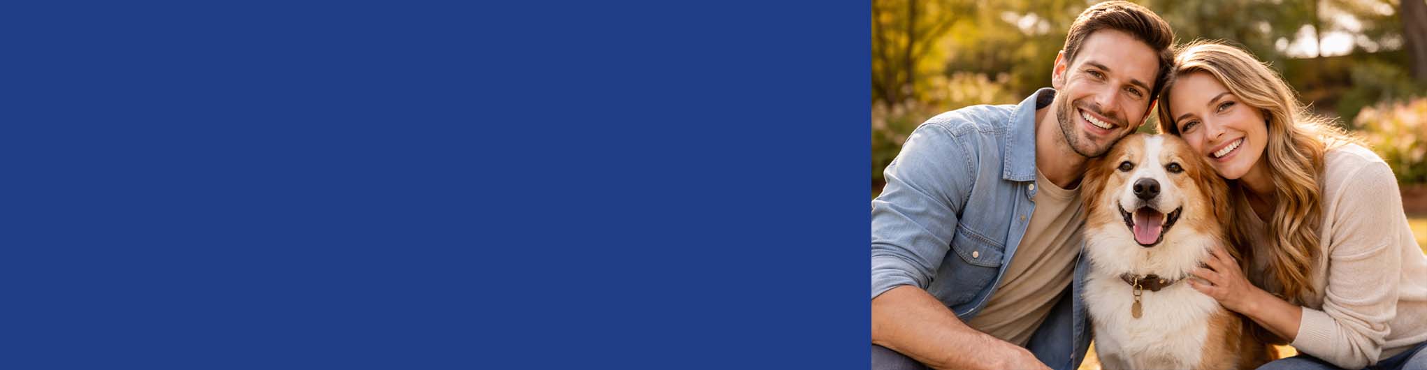 American pet owners enjoying time with their dog in a park